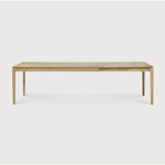 This Oak Bok Extendable Dining Table is perfect for families who want extra space when their kids, extended family, or guests come to celebrate! Its airy shape yet rock solid construction make this piece a timeless and remarkable design to enjoy for years to come.  Material: Oak, 100% Solid Wood Finish: Oiled