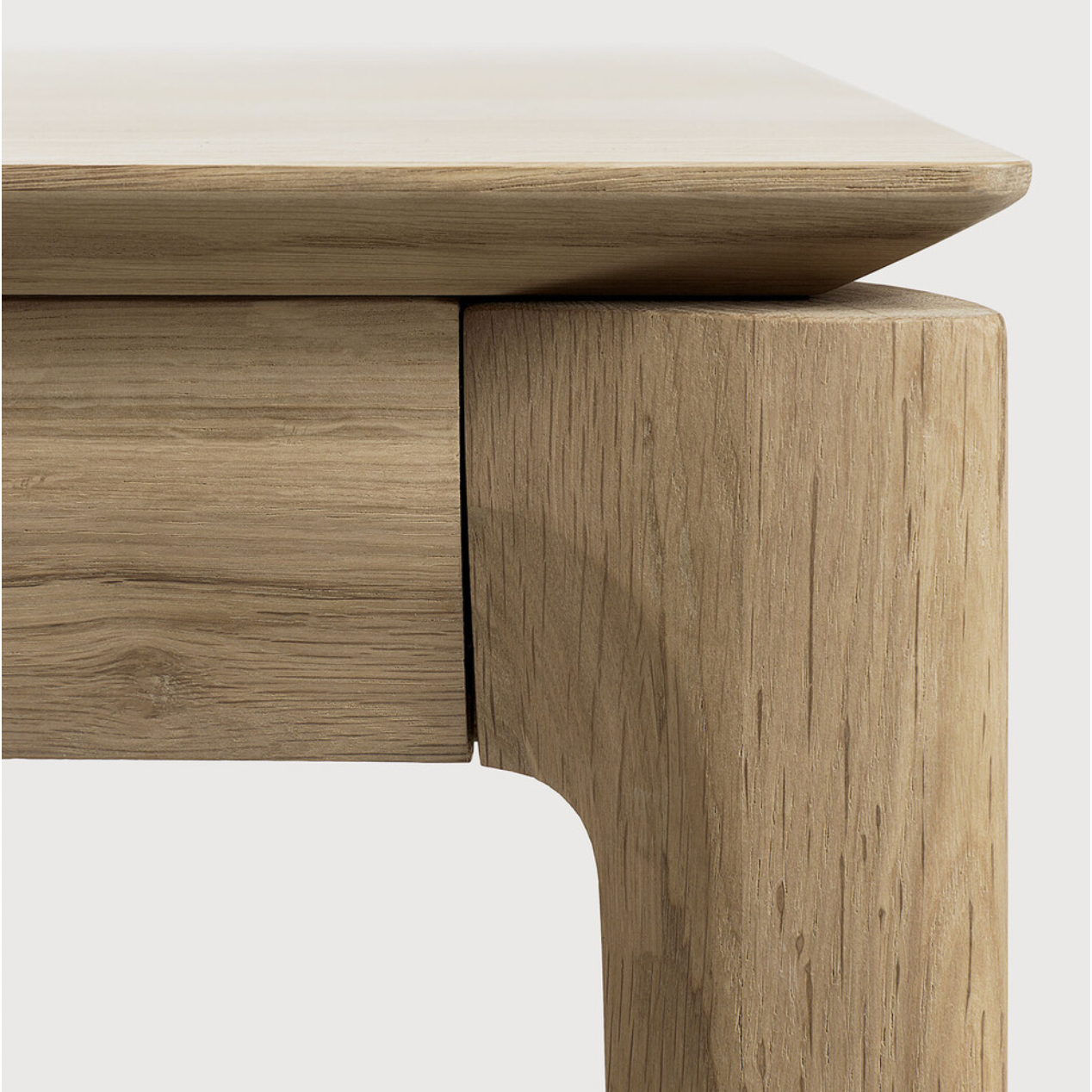 This Oak Bok Extendable Dining Table is perfect for families who want extra space when their kids, extended family, or guests come to celebrate! Its airy shape yet rock solid construction make this piece a timeless and remarkable design to enjoy for years to come.  Material: Oak, 100% Solid Wood Finish: Oiled