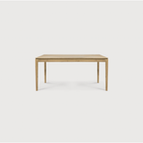 This Oak Bok Extendable Dining Table is perfect for families who want extra space when their kids, extended family, or guests come to celebrate! Its airy shape yet rock solid construction make this piece a timeless and remarkable design to enjoy for years to come.  Material: Oak, 100% Solid Wood Finish: Oiled