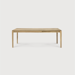 This Oak Bok Extendable Dining Table is perfect for families who want extra space when their kids, extended family, or guests come to celebrate! Its airy shape yet rock solid construction make this piece a timeless and remarkable design to enjoy for years to come.  Material: Oak, 100% Solid Wood Finish: Oiled