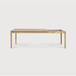 This Oak Bok Extendable Dining Table is perfect for families who want extra space when their kids, extended family, or guests come to celebrate! Its airy shape yet rock solid construction make this piece a timeless and remarkable design to enjoy for years to come.  Material: Oak, 100% Solid Wood Finish: Oiled