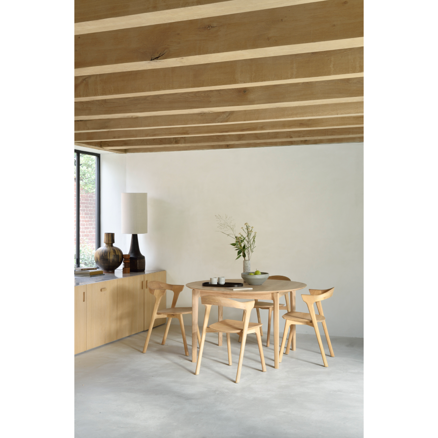 Featuring Oak Bok Round Extendable Dining Table by Ethnicraft at Amethyst Home. This Oak Bok Round Extendable Dining Table offers the perfect solution for adaptable dining within a smaller space. The iconic airy shape and solid construction make for a timeless design to enjoy for years to come.
Material: Oak, 100% Solid WoodFinish: Oiled
Dimensions: 51"w x .  Amethyst Home provides interior design, new home construction design consulting, vintage area rugs, and lighting in the Monterey metro area.