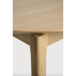 Featuring Oak Bok Round Extendable Dining Table by Ethnicraft at Amethyst Home. This Oak Bok Round Extendable Dining Table offers the perfect solution for adaptable dining within a smaller space. The iconic airy shape and solid construction make for a timeless design to enjoy for years to come.
Material: Oak, 100% Solid WoodFinish: Oiled
Dimensions: 51"w x 51".  Amethyst Home provides interior design, new home construction design consulting, vintage area rugs, and lighting in the Miami metro area.