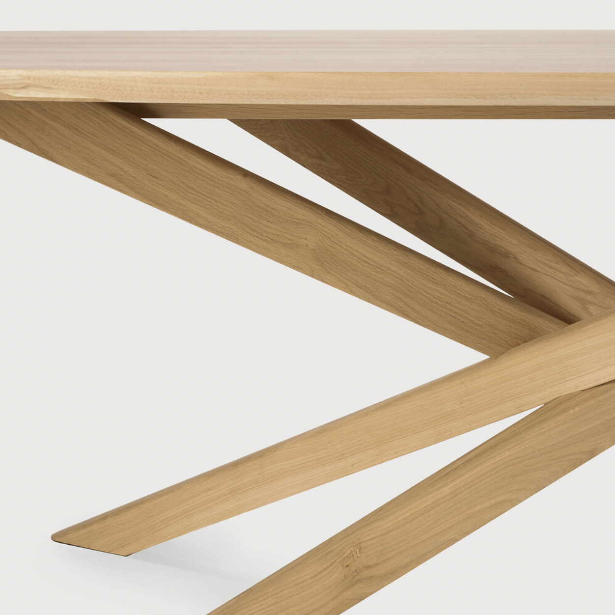 Featuring Oak Mikado Coffee Table by Ethnicraft at Amethyst Home. The Oak Mikado Coffee Table, designed by Alain van Havre, is a study of balance and symmetry. The interested base brings a unique look to any living room or lounge area!
Oval Dimension: 56.5"w x 26.5"d x 17"h Weight: 35 lbs
Round Dimension: 39.5"w x 39.5"d x 17"hWeight: 40 lbs
Material: Oak,.  Amethyst Home provides interior design, new home construction design consulting, vintage area rugs, and lighting in the Charlotte metro area.
