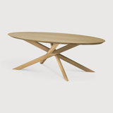 Featuring Oak Mikado Coffee Table by Ethnicraft at Amethyst Home. The Oak Mikado Coffee Table, designed by Alain van Havre, is a study of balance and symmetry. The interested base brings a unique look to any living room or lounge area!
Oval Dimension: 56.5"w x 26.5"d x 17"h Weight: 35 lbs
Round Dimension: 39.5"w x 39.5"d x 17"hWeight: 40 lbs
Material: .  Amethyst Home provides interior design, new home construction design consulting, vintage area rugs, and lighting in the Winter Garden metro area.