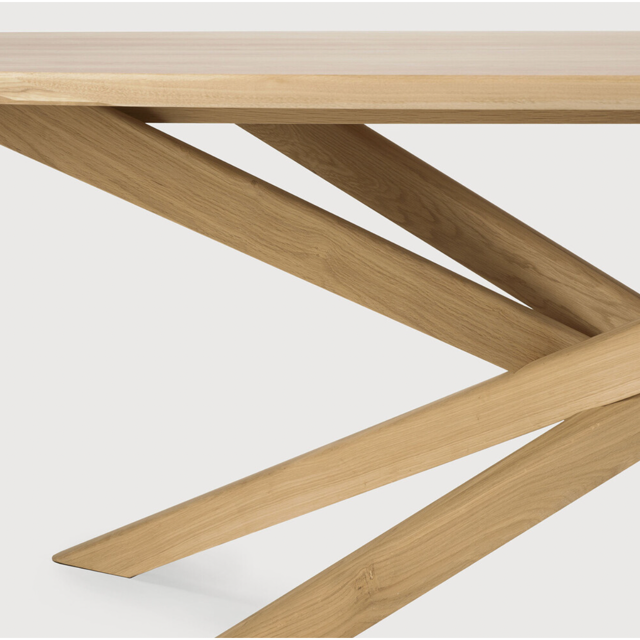 Featuring Oak Mikado Coffee Table by Ethnicraft at Amethyst Home. The Oak Mikado Coffee Table, designed by Alain van Havre, is a study of balance and symmetry. The interested base brings a unique look to any living room or lounge area!
Oval Dimension: 56.5"w x 26.5"d x 17"h Weight: 35 lbs
Round Dimension: 39.5"w x 39.5"d x 17"hWeight: 40 lbs
Material: Oak.  Amethyst Home provides interior design, new home construction design consulting, vintage area rugs, and lighting in the Washington metro area.