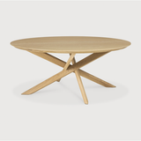 Featuring Oak Mikado Coffee Table by Ethnicraft at Amethyst Home. The Oak Mikado Coffee Table, designed by Alain van Havre, is a study of balance and symmetry. The interested base brings a unique look to any living room or lounge area!
Oval Dimension: 56.5"w x 26.5"d x 17"h Weight: 35 lbs
Round Dimension: 39.5"w x 39.5"d x 17"hWeight: 40 lbs
Material: Oak,.  Amethyst Home provides interior design, new home construction design consulting, vintage area rugs, and lighting in the San Diego metro area.