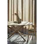 We love the sculptural character of this Oak Mikado Dining Table - Round. The legs interlock like a well-thought-out puzzle, making it easier to interact with your guests and allows you to converse with your family and friends for years to come!  Designed by Alain van Havre  Material: Oak, 100% Solid Wood Finish: Oiled