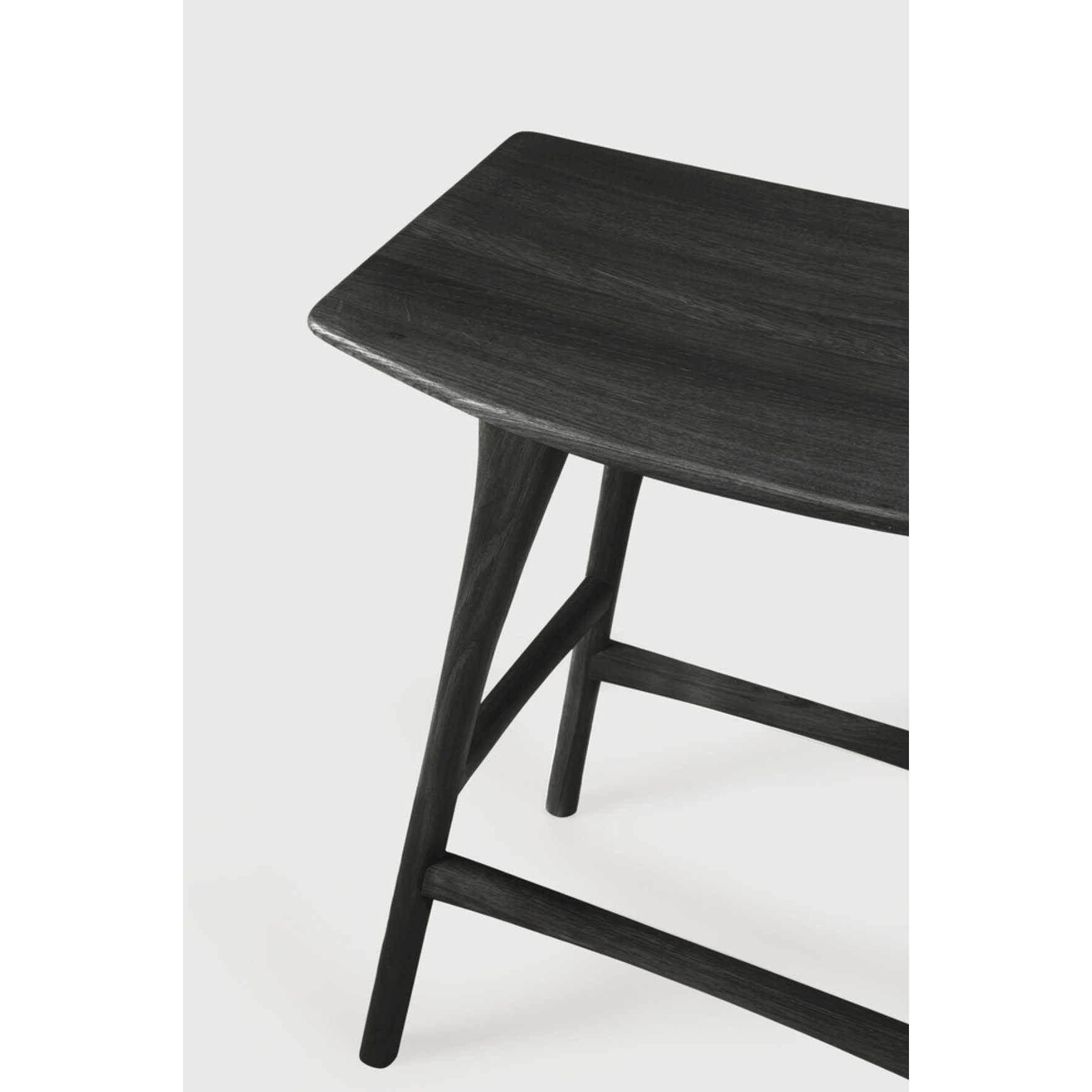 We love the versatility of this Oak Osso Bar + Counter Stool - Black.  A sleek piece to add in your bar area, kitchen island, or a standing desk stool.   Bar Dimensions: 22.5"w x 13"d x 31.5"h Seat Height: 30.5"  Counter Dimensions: 22.5"w x 14.5"d x 24.5"h Seat Height: 23"  Material: Oak, 100% Solid Wood Finish: Varnished