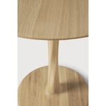 Featuring Oak Round Torsion Dining Table by Ethnicraft at Amethyst Home. Airy with subtle complexities, this Oak Round Torsion Dining Table incorporates advanced woodworking techniques to create a light table top with a torsaded base of sculptural elegance -- sure to elevate the look for any dining or kitchen area. 
Material: Oak, 100% Solid WoodFinish:.  Amethyst Home provides interior design, new home construction design consulting, vintage area rugs, and lighting in the Laguna Beach metro area.