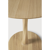Featuring Oak Round Torsion Dining Table by Ethnicraft at Amethyst Home. Airy with subtle complexities, this Oak Round Torsion Dining Table incorporates advanced woodworking techniques to create a light table top with a torsaded base of sculptural elegance -- sure to elevate the look for any dining or kitchen area. 
Material: Oak, 100% Solid WoodFinish:.  Amethyst Home provides interior design, new home construction design consulting, vintage area rugs, and lighting in the Laguna Beach metro area.