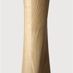 Featuring Oak Round Torsion Dining Table by Ethnicraft at Amethyst Home. Airy with subtle complexities, this Oak Round Torsion Dining Table incorporates advanced woodworking techniques to create a light table top with a torsaded base of sculptural elegance -- sure to elevate the look for any dining or kitchen area. 
Material: Oak, 100% Solid WoodFinish: .  Amethyst Home provides interior design, new home construction design consulting, vintage area rugs, and lighting in the Kansas City metro area.