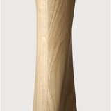Featuring Oak Round Torsion Dining Table by Ethnicraft at Amethyst Home. Airy with subtle complexities, this Oak Round Torsion Dining Table incorporates advanced woodworking techniques to create a light table top with a torsaded base of sculptural elegance -- sure to elevate the look for any dining or kitchen area. 
Material: Oak, 100% Solid WoodFinish: .  Amethyst Home provides interior design, new home construction design consulting, vintage area rugs, and lighting in the Kansas City metro area.