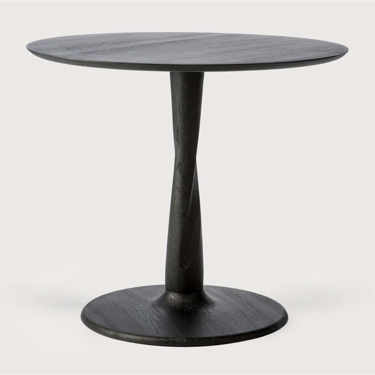 Featuring Oak Round Torsion Dining Table - Black by Ethnicraft at Amethyst Home. We love the modern, sleek look of this Oak Torsion Dining Table - Black. The varnish finish gives more depth, with the rougher surface highlighting the grain of the wood.
Dimensions 28": 28"w x 28"d x 30"h Weight: 46 lbs
Dimensions 35.5": 35.5"w x 25.5" x 30"hWeight: 73 lb.  Amethyst Home provides interior design, new home construction design consulting, vintage area rugs, and lighting in the Winter Garden metro area.