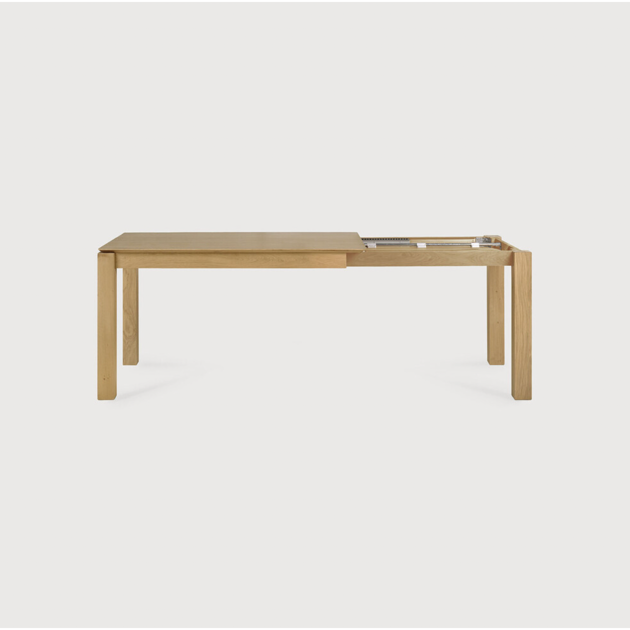 This Oak Slice Extendable Dining Table features a unique character with just a little extra added. This table can easily be extended without interruption of the wood grain pattern -- perfect for gathering your family or friends for hosting parties or the holidays!   Material: Oak, 100% Solid Wood Finish: Oiled