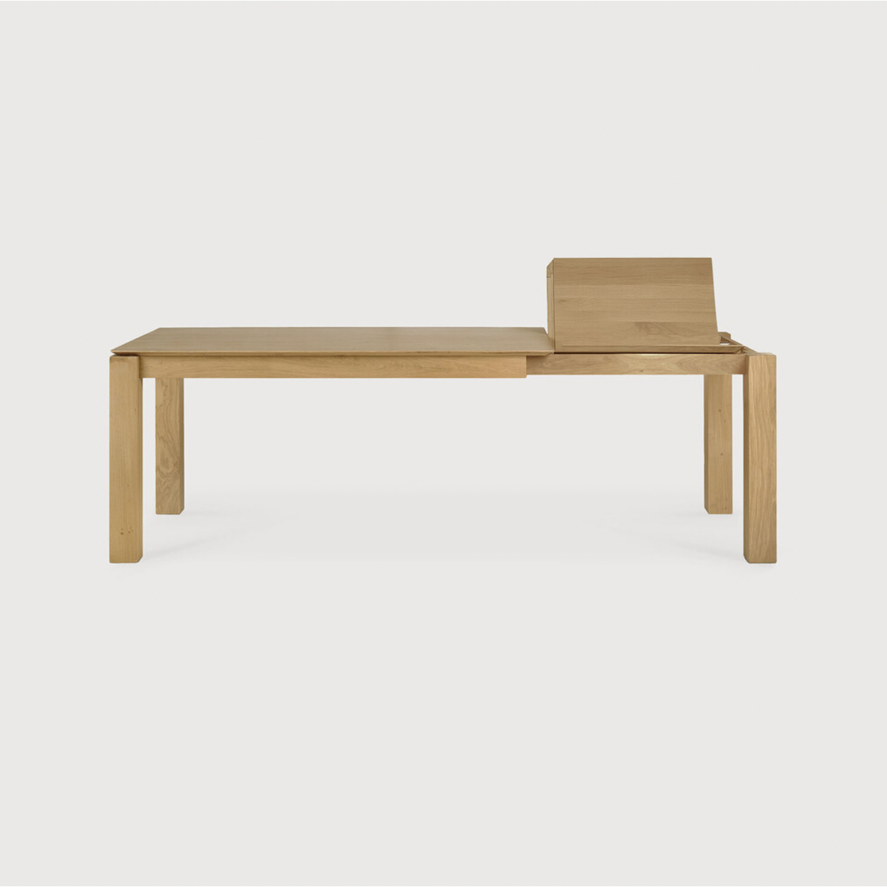 This Oak Slice Extendable Dining Table features a unique character with just a little extra added. This table can easily be extended without interruption of the wood grain pattern -- perfect for gathering your family or friends for hosting parties or the holidays!   Material: Oak, 100% Solid Wood Finish: Oiled