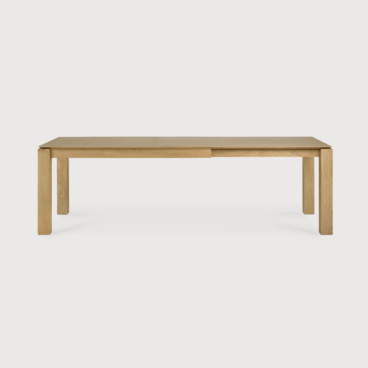This Oak Slice Extendable Dining Table features a unique character with just a little extra added. This table can easily be extended without interruption of the wood grain pattern -- perfect for gathering your family or friends for hosting parties or the holidays!   Material: Oak, 100% Solid Wood Finish: Oiled