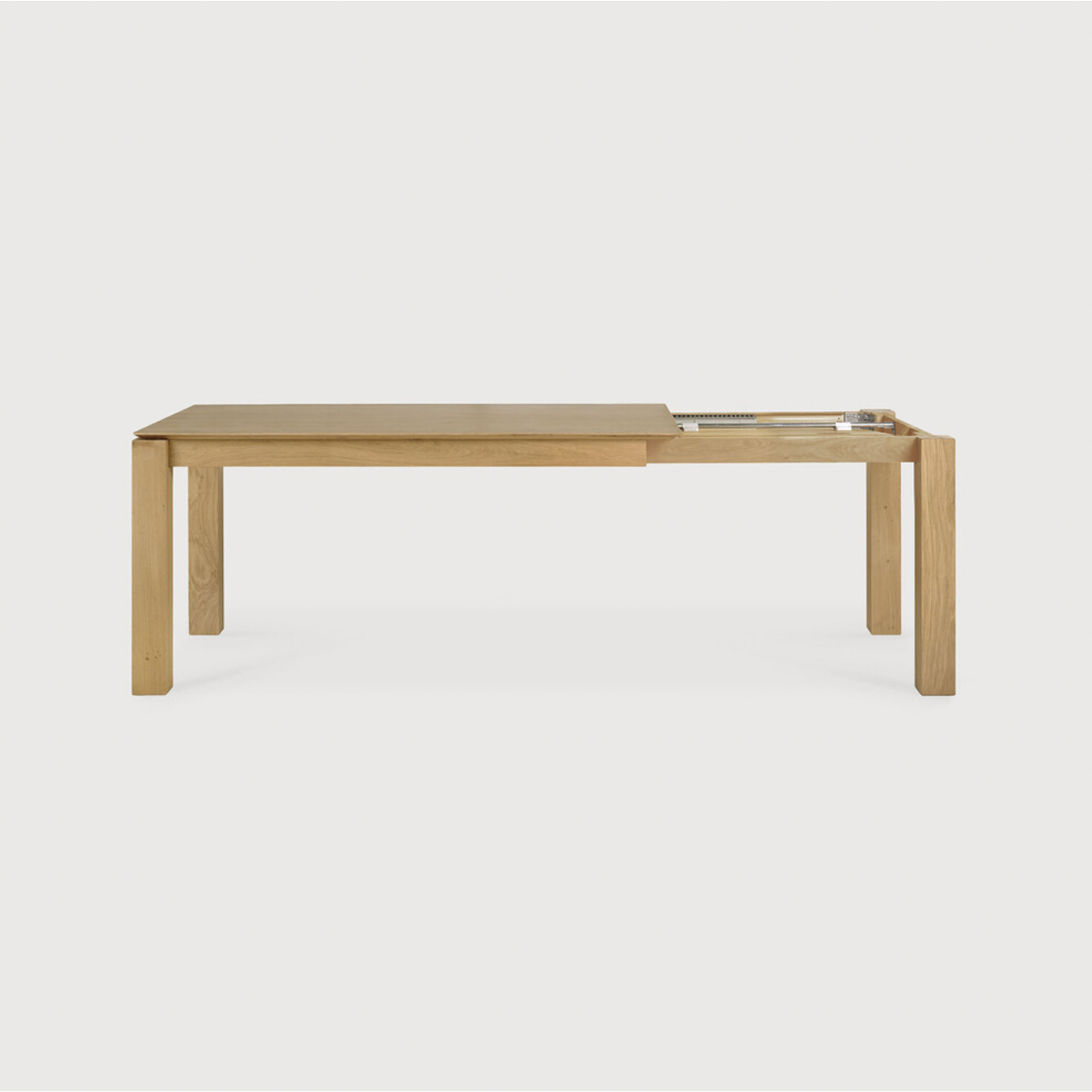 This Oak Slice Extendable Dining Table features a unique character with just a little extra added. This table can easily be extended without interruption of the wood grain pattern -- perfect for gathering your family or friends for hosting parties or the holidays!   Material: Oak, 100% Solid Wood Finish: Oiled