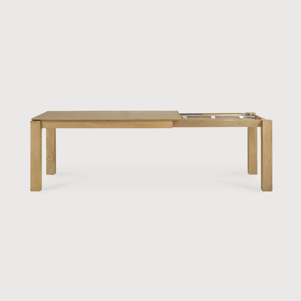 This Oak Slice Extendable Dining Table features a unique character with just a little extra added. This table can easily be extended without interruption of the wood grain pattern -- perfect for gathering your family or friends for hosting parties or the holidays!   Material: Oak, 100% Solid Wood Finish: Oiled