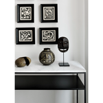 We love that the Stone console is an even mix of contemporary and glamorous elements bringing a touch of chic style to your entry way or living room. With its modern open metal frame and its pristine marble, we admire the simple lines and sleek design by designer, Djordje Cukanovic.  Dimensions: 47.5"w x 16"d x 34"h  Weight: 91 lbs  Material: Marble top, black metal frame