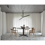 This Teak Bok Dining Chair features an airy shape with rock-solid construction,  making this piece a timeless and remarkable design to enjoy for years to come. Pair with a dining table or stand-alone against a wall, hallway, or end of the bed! Designed by Alain can Havre  Dimensions: 20"w x 21.5"d x 30"h  Weight: 12 lbs  Seat Height: 18"  Material: Oak, 100% solid wood Finish: Varnished