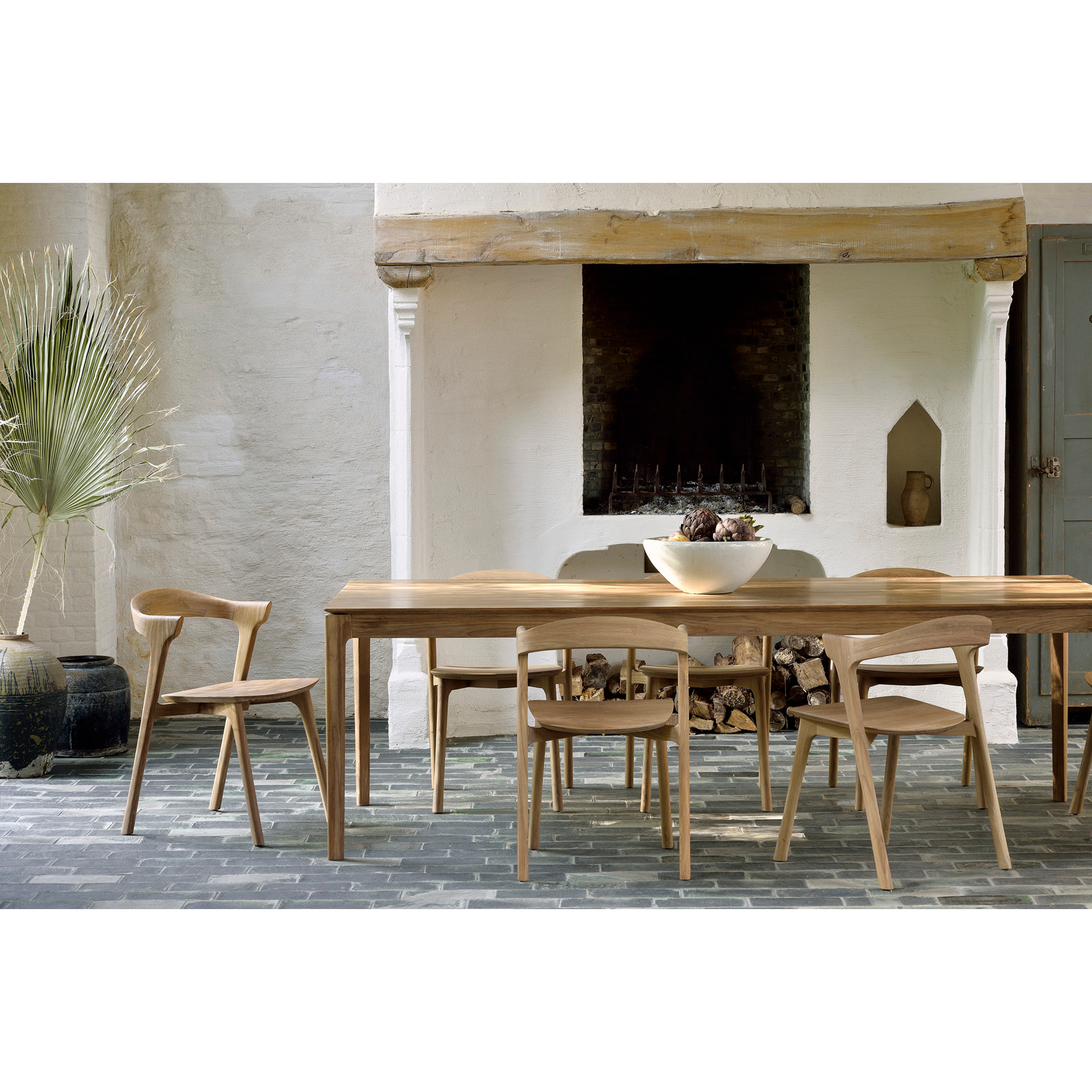 This Teak Bok Dining Chair features an airy shape with rock-solid construction,  making this piece a timeless and remarkable design to enjoy for years to come. Pair with a dining table or stand-alone against a wall, hallway, or end of the bed! Designed by Alain can Havre  Dimensions: 20"w x 21.5"d x 30"h  Weight: 12 lbs  Seat Height: 18"  Material: Oak, 100% solid wood Finish: Varnished