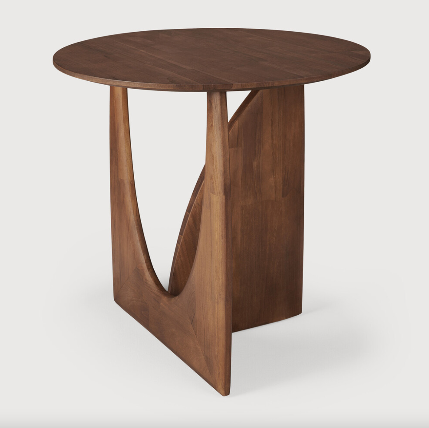 From any angle, the Teak Geometric Side Table does not only look different, it also becomes different. We love seeing this table as a sculptural accent to your living space or office.  Designed by Alain van Havre  Dimensions: 20.5"w x 20.5"d x 20"h  Weight: 11 lbs  Material: Teak Finish: Varnished