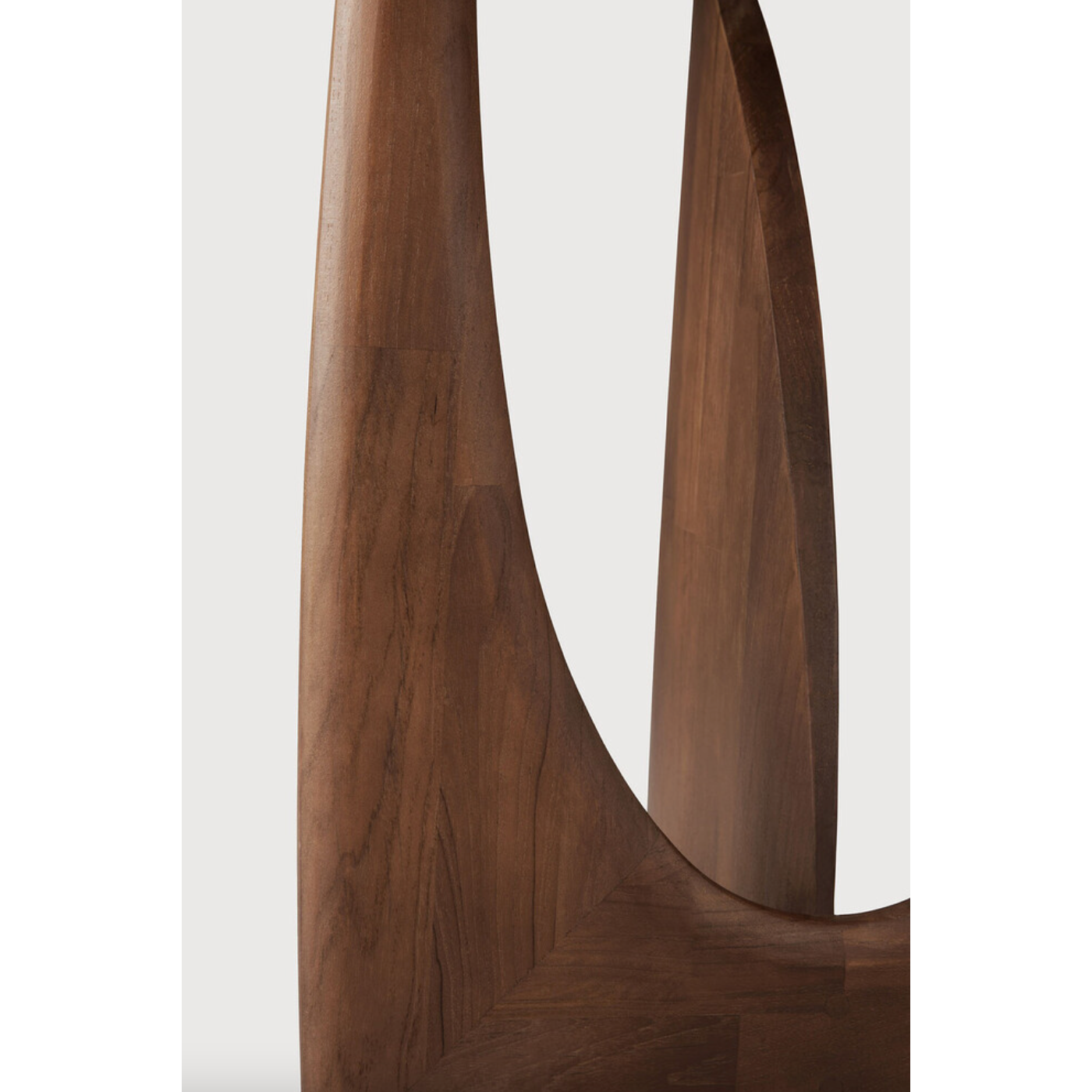 From any angle, the Teak Geometric Side Table does not only look different, it also becomes different. We love seeing this table as a sculptural accent to your living space or office.  Designed by Alain van Havre  Dimensions: 20.5"w x 20.5"d x 20"h  Weight: 11 lbs  Material: Teak Finish: Varnished