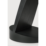 We love the unique base of this Teak Oblic Side Table - Black. Place near your sofa, bed side table, or accent chair to completely elevate the space!  Dimensions: 20.5"w x 20.5"d x 19.5"h  Weight: 21 lbs  Material: Teak, 100% Solid Wood Finish: Varnished