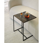 The Triptic table is a chic and practical side table that could sit perfectly with your sofa, ideal for a laptop or beverages. We love how this little table will elevate your living space aesthetically and functionally! We can't get enough of this distinctive table top finish that is made from mineral powders, water, earth, natural color pigments and metallic powders.  Dimensions: 18"w x 16"d x 20.5"h  Weight: 19 lbs  Material: Minerals  Finish: Metallic