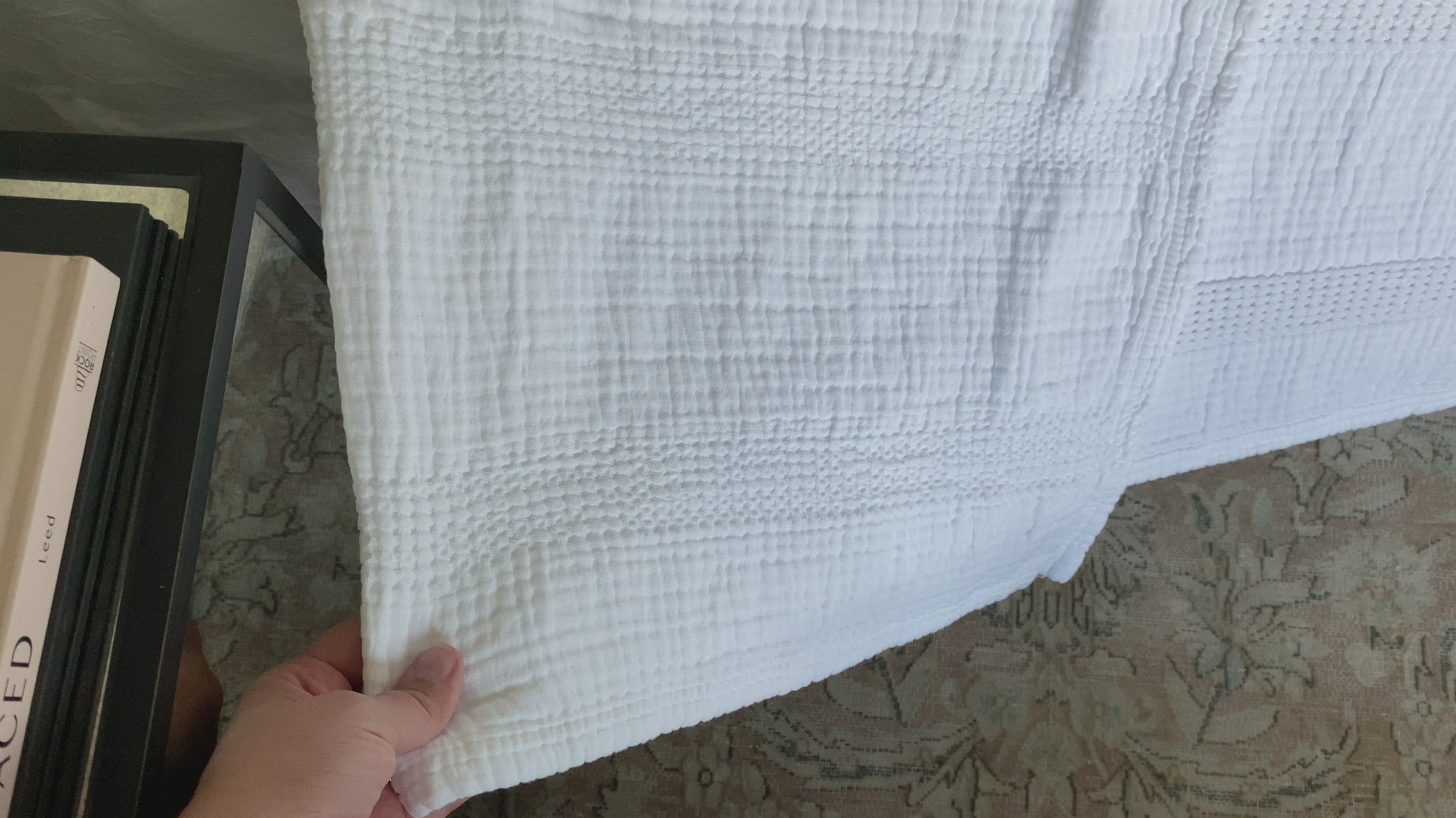 Crafted in Portugal, the Nantucket White Matelasse by Pom Pom at Home is a modern take on the matelasse with its beautiful interwoven weave. We love the soft, puckered appearance this brings to a bedroom.  100% cotton. Machine wash cold; tumble dry low; warm iron as needed. Do not bleach      