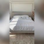 Crafted in Portugal, the Nantucket White Matelasse by Pom Pom at Home is a modern take on the matelasse with its beautiful interwoven weave. We love the soft, puckered appearance this brings to a bedroom.  100% cotton. Machine wash cold; tumble dry low; warm iron as needed. Do not bleach      