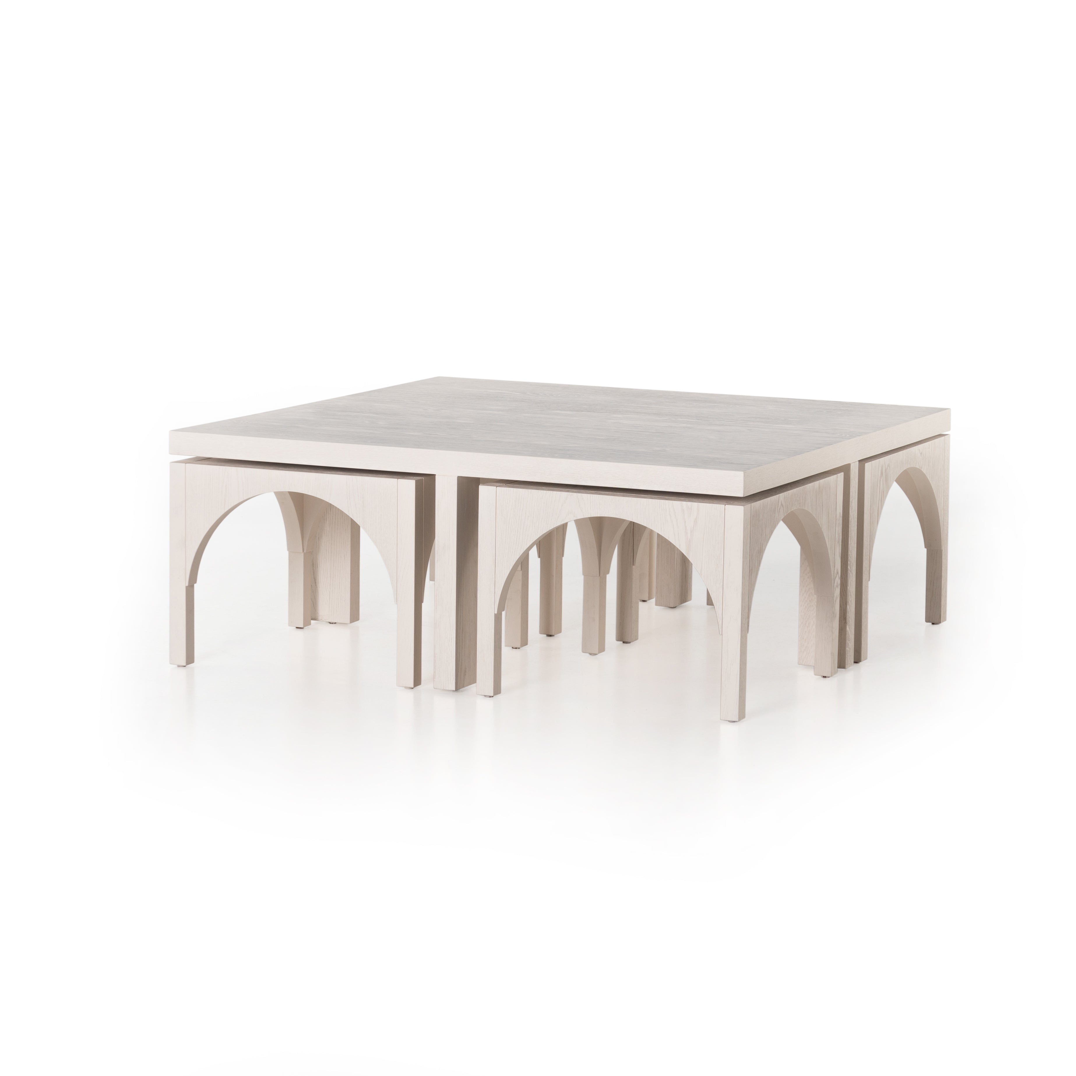 Featuring Amara Coffee Table by Four Hands at Amethyst Home. Meet a forward-thinking oak coffee table as stylish as it is functional with this Amara Coffee Table. We love the beautifully arched sides with four separate nesting tables that slide out to create ample extra surfaces as needed, tucking back under with ease.
Overall Dimensions: 47.25"W x 47.25"L.  Amethyst Home provides interior design, new home construction design consulting, vintage area rugs, and lighting in the Nashville metro area.