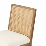 The love the retro style the natural cane of this Antonia Cane Toasted Nettlewood Armless Dining Chair brings to a dining room.   Overall Dimensions: 22.50"w x 23.50"d x 33.00"h Seat Depth: 19.25" Seat Height: 19.5"  Colors: Natural Cane, Toasted Nettlewood, Savile Flax Materials: Cane, Solid Nettlewood, 92% Pl, 8% Li