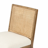 The love the retro style the natural cane of this Antonia Cane Toasted Nettlewood Armless Dining Chair brings to a dining room.   Overall Dimensions: 22.50"w x 23.50"d x 33.00"h Seat Depth: 19.25" Seat Height: 19.5"  Colors: Natural Cane, Toasted Nettlewood, Savile Flax Materials: Cane, Solid Nettlewood, 92% Pl, 8% Li