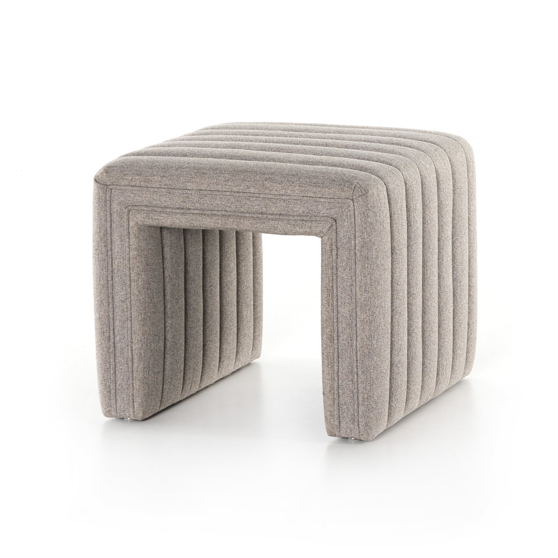 We love the dramatic channeling of this Augustine Ottoman - Orly Natural. Match it with the Augustine Swivel and complete the whole space!  Overall Dimensions: 21.50"w x 21.00"d x 18.00"h  Colors: Orly Natural Materials: 100% Polyester