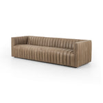 This Augustine 97" Sofa - Palermo Drift features dramatically channeled upholstered in taupe top-grain leather. We love the crisp, clean look and sumptuous sit this offers to a space!   Size: 97"w x 35"d x 26.5"h