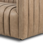 This Augustine 97" Sofa - Palermo Drift features dramatically channeled upholstered in taupe top-grain leather. We love the crisp, clean look and sumptuous sit this offers to a space!   Size: 97"w x 35"d x 26.5"h