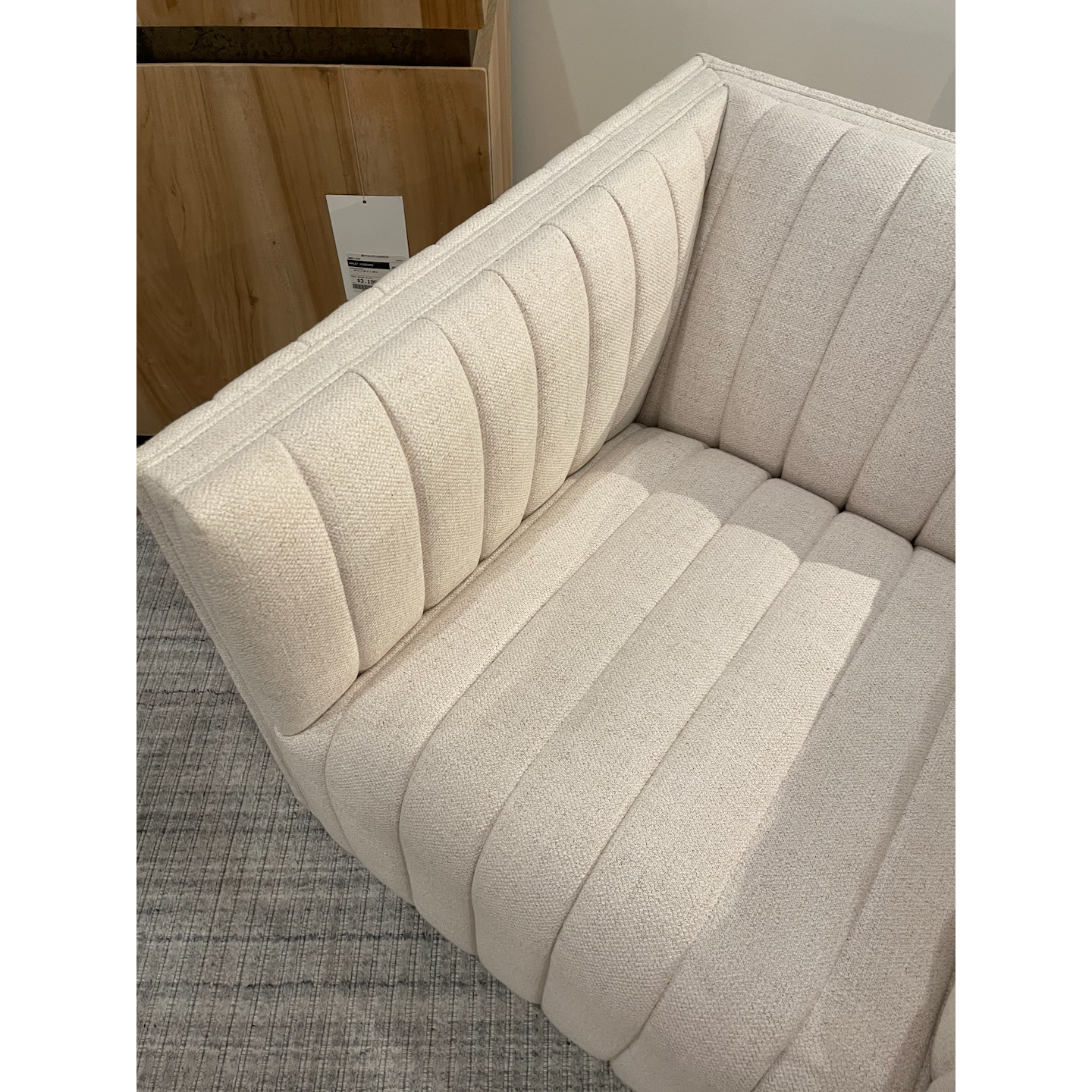 Featuring Augustine Swivel Chair - Cream by Four Hands at Amethyst Home. You will love the dramatic channeling of this Augustine Cream Swivel Chair. The swivel feature sets this apart from other chairs and is a great choice for any living room or media room. This chair is comfort wrapped in soft linen blend making this everyone's favorite chair.Overall Di.  Amethyst Home provides interior design, new home construction design consulting, vintage area rugs, and lighting in the Des Moines metro area.