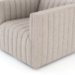 You will love the dramatic channeling of this Augustine Swivel Chair - Orly Natural. The swivel feature sets this apart from other chairs and is a great choice for any living room or media room. This chair is comfort wrapped in soft linen blend making this everyone's favorite chair.  Overall Dimensions: 32.00"w x 34.00"d x 26.50"h