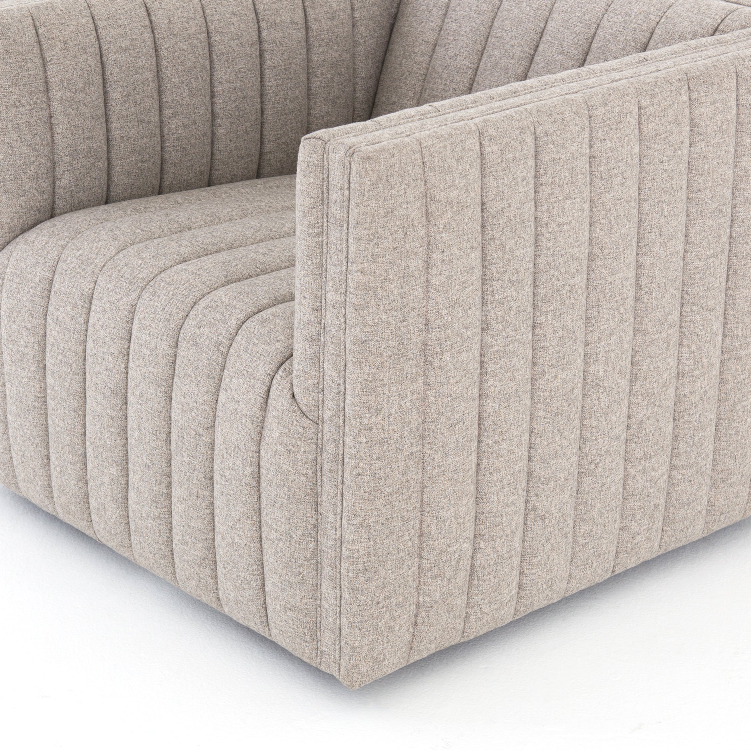 You will love the dramatic channeling of this Augustine Swivel Chair - Orly Natural. The swivel feature sets this apart from other chairs and is a great choice for any living room or media room. This chair is comfort wrapped in soft linen blend making this everyone's favorite chair.  Overall Dimensions: 32.00"w x 34.00"d x 26.50"h