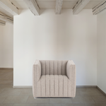 You will love the dramatic channeling of this Augustine Swivel Chair - Orly Natural. The swivel feature sets this apart from other chairs and is a great choice for any living room or media room. This chair is comfort wrapped in soft linen blend making this everyone's favorite chair.  Overall Dimensions: 32.00"w x 34.00"d x 26.50"h