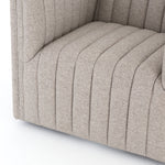 You will love the dramatic channeling of this Augustine Swivel Chair - Orly Natural. The swivel feature sets this apart from other chairs and is a great choice for any living room or media room. This chair is comfort wrapped in soft linen blend making this everyone's favorite chair.  Overall Dimensions: 32.00"w x 34.00"d x 26.50"h