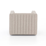 You will love the dramatic channeling of this Augustine Swivel Chair - Orly Natural. The swivel feature sets this apart from other chairs and is a great choice for any living room or media room. This chair is comfort wrapped in soft linen blend making this everyone's favorite chair.  Overall Dimensions: 32.00"w x 34.00"d x 26.50"h