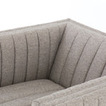 You will love the dramatic channeling of this Augustine Swivel Chair - Orly Natural. The swivel feature sets this apart from other chairs and is a great choice for any living room or media room. This chair is comfort wrapped in soft linen blend making this everyone's favorite chair.  Overall Dimensions: 32.00"w x 34.00"d x 26.50"h
