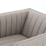 You will love the dramatic channeling of this Augustine Swivel Chair - Orly Natural. The swivel feature sets this apart from other chairs and is a great choice for any living room or media room. This chair is comfort wrapped in soft linen blend making this everyone's favorite chair.  Overall Dimensions: 32.00"w x 34.00"d x 26.50"h