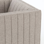 You will love the dramatic channeling of this Augustine Swivel Chair - Orly Natural. The swivel feature sets this apart from other chairs and is a great choice for any living room or media room. This chair is comfort wrapped in soft linen blend making this everyone's favorite chair.  Overall Dimensions: 32.00"w x 34.00"d x 26.50"h