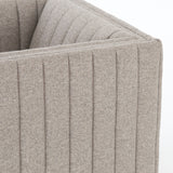 You will love the dramatic channeling of this Augustine Swivel Chair - Orly Natural. The swivel feature sets this apart from other chairs and is a great choice for any living room or media room. This chair is comfort wrapped in soft linen blend making this everyone's favorite chair.  Overall Dimensions: 32.00"w x 34.00"d x 26.50"h