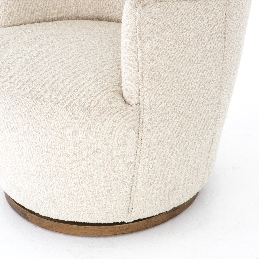 We love the drum-style seating of this Aurora Swivel - Knoll Natural. Upholstered in a soothing and textural off-white bouclé, this also features a swivel base - perfect for your office, living room, or other space!  Overall Dimensions: 26.00"w x 31.50"d x 31.00"h