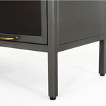 Featuring Aviva Barrister Cabinet by Four Hands at Amethyst Home. Inspired by the stackable barrister-style shelving, iron casing is finished in a gunmetal for a fresh industrial look, with smoked glass panes with flat brass hardware cover door fronts, each lifting to spacious compartments for storage of books and treasures.
Overall Dimensions: 32"W x 15"L x.  Amethyst Home provides interior design, new home construction design consulting, vintage area rugs, and lighting in the Seattle metro area.